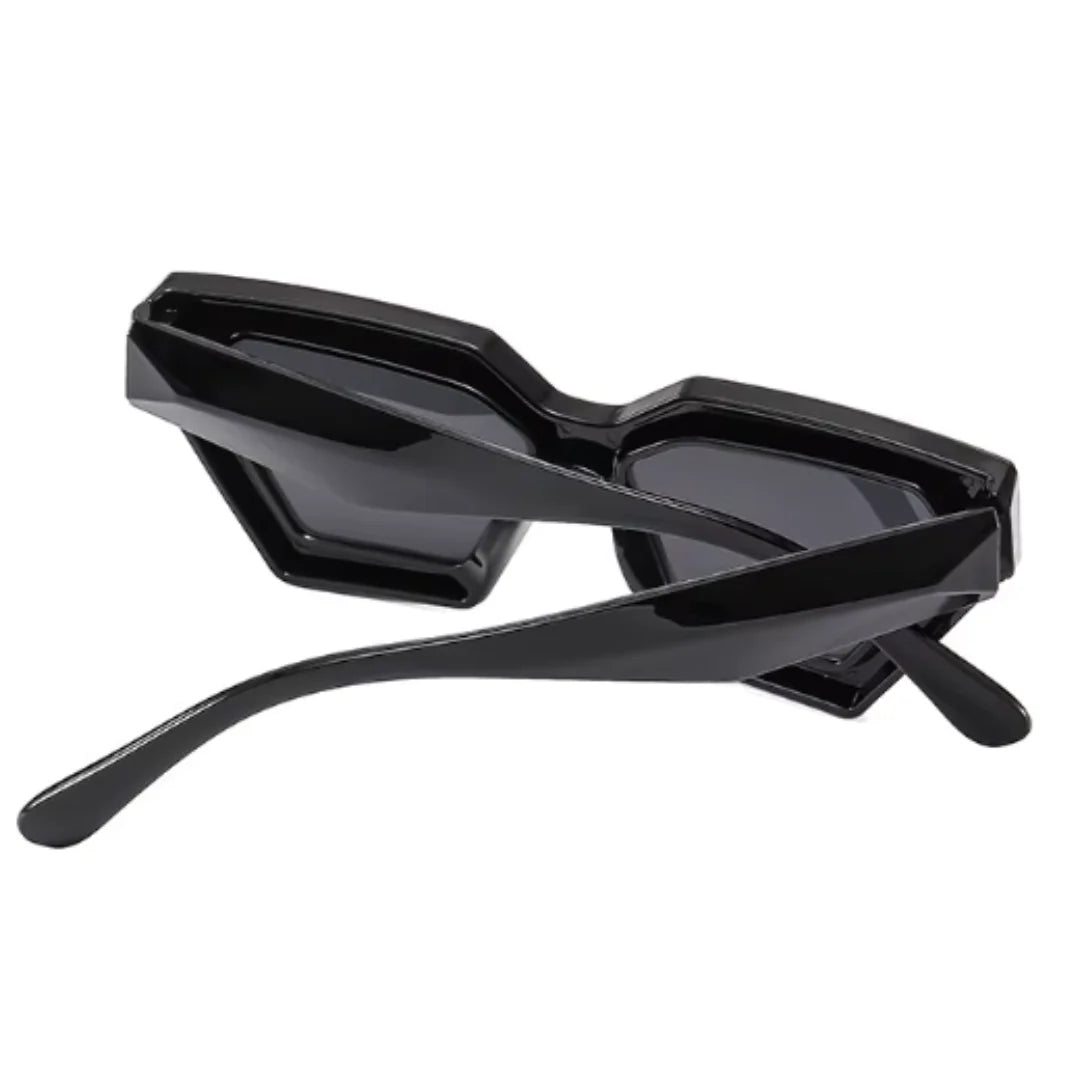 Rear view of Paris futuristic geometric sunglasses in Black acetate frame with Black TAC lenses, 100% UV protection, temples crossed, on white background.