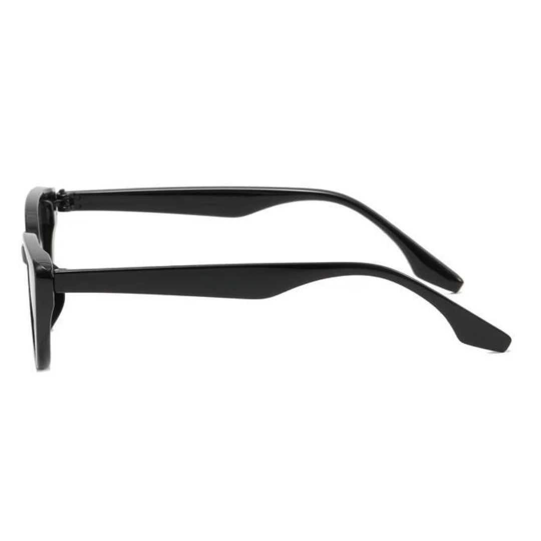 Side view of Noire women’s cat-eye shades in Black frame with Black lenses, on white background — polycarbonate frame, acrylic lenses, 100% UV protection