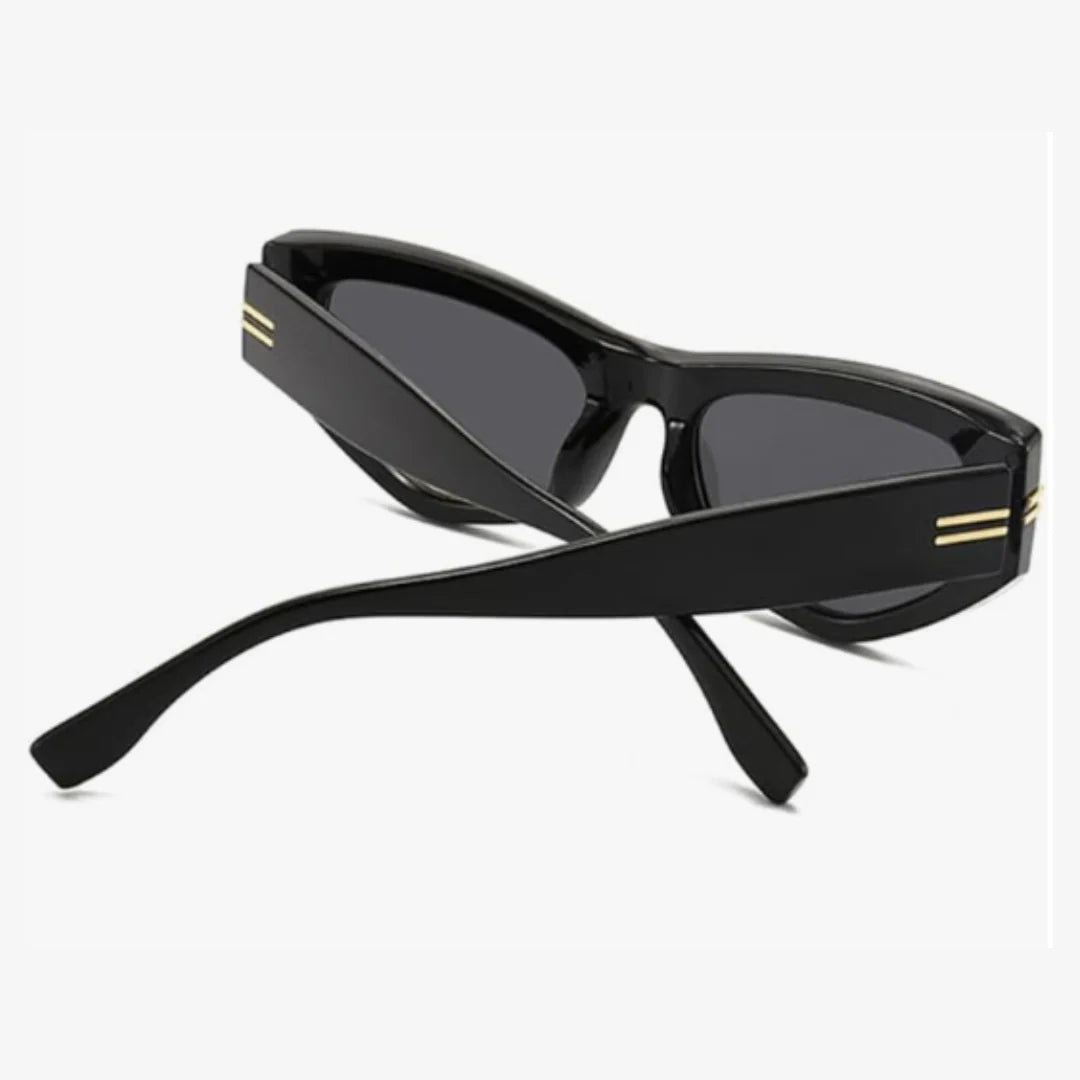 Rear view of Luxe women’s cat-eye sunglasses in Black frame with Black lenses, with temples crossed, on white background — acetate frame, TAC lenses, 100% UV protection