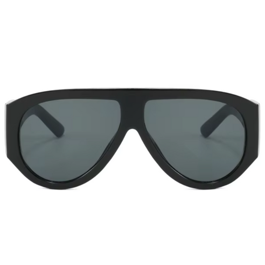 Front view of Delphine women’s shield sunglasses in Black frame with Black lenses, on white background — acetate frame, TAC lenses, 100% UV protection