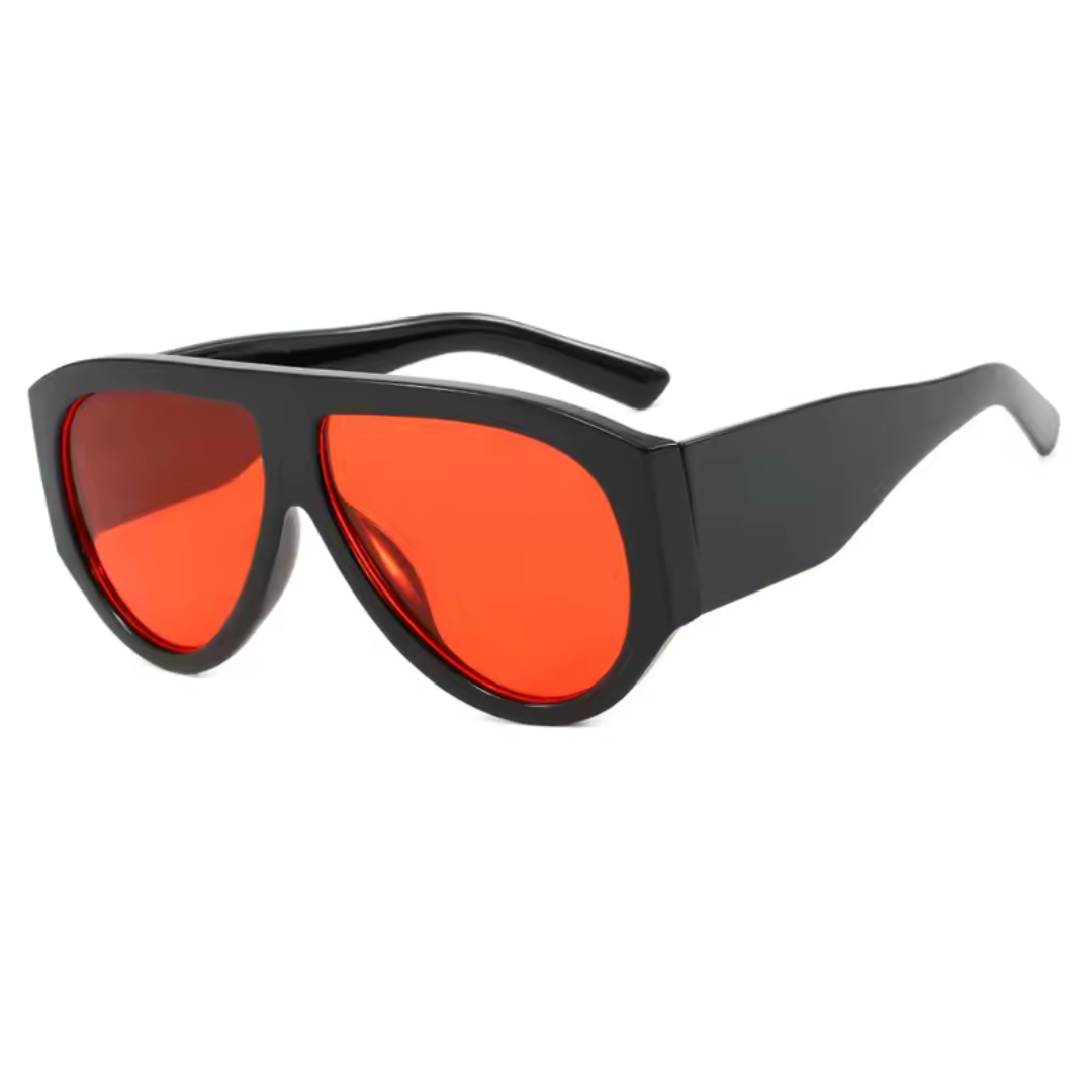 Right 3/4 angle of Delphine women’s shield shades in Black frame with Red lenses, on white background — acetate frame, TAC lenses, 100% UV protection