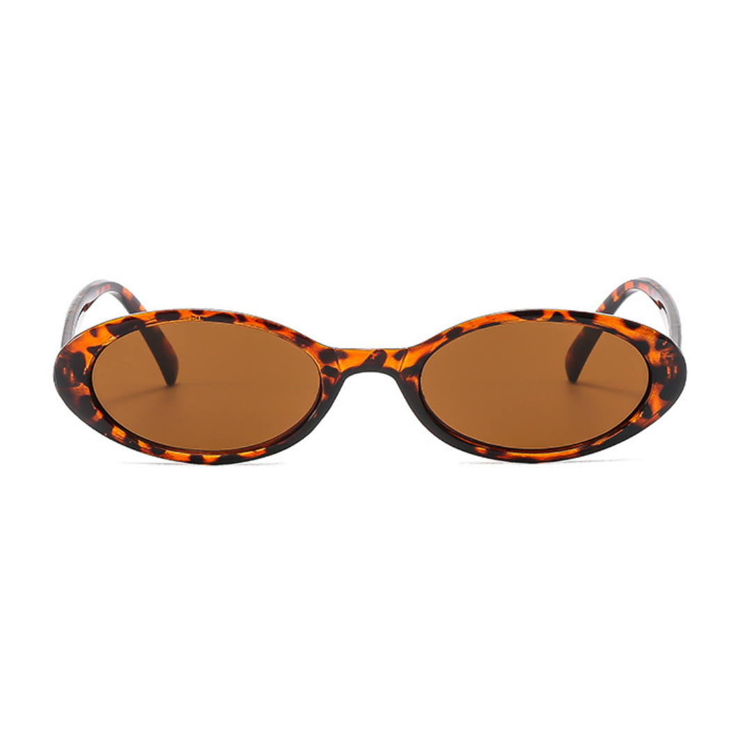Évara oval women's sunglasses in Leopard polycarbonate frame with amber polycarbonate lenses, 100% UV protection, front view on white background