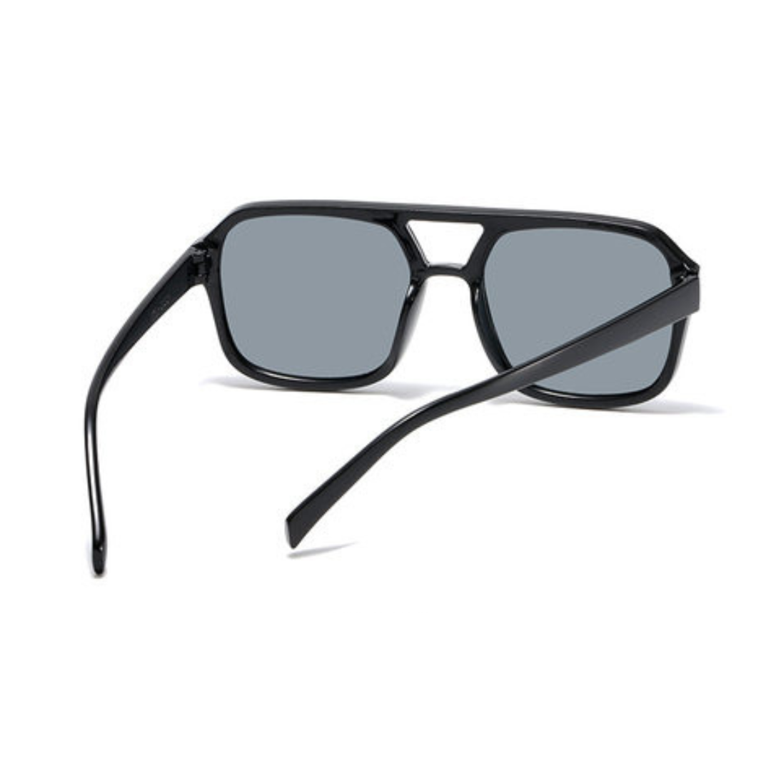 Zentha square shield women's sunglasses in Black frame with black lenses, rear view with temples uncrossed on white background