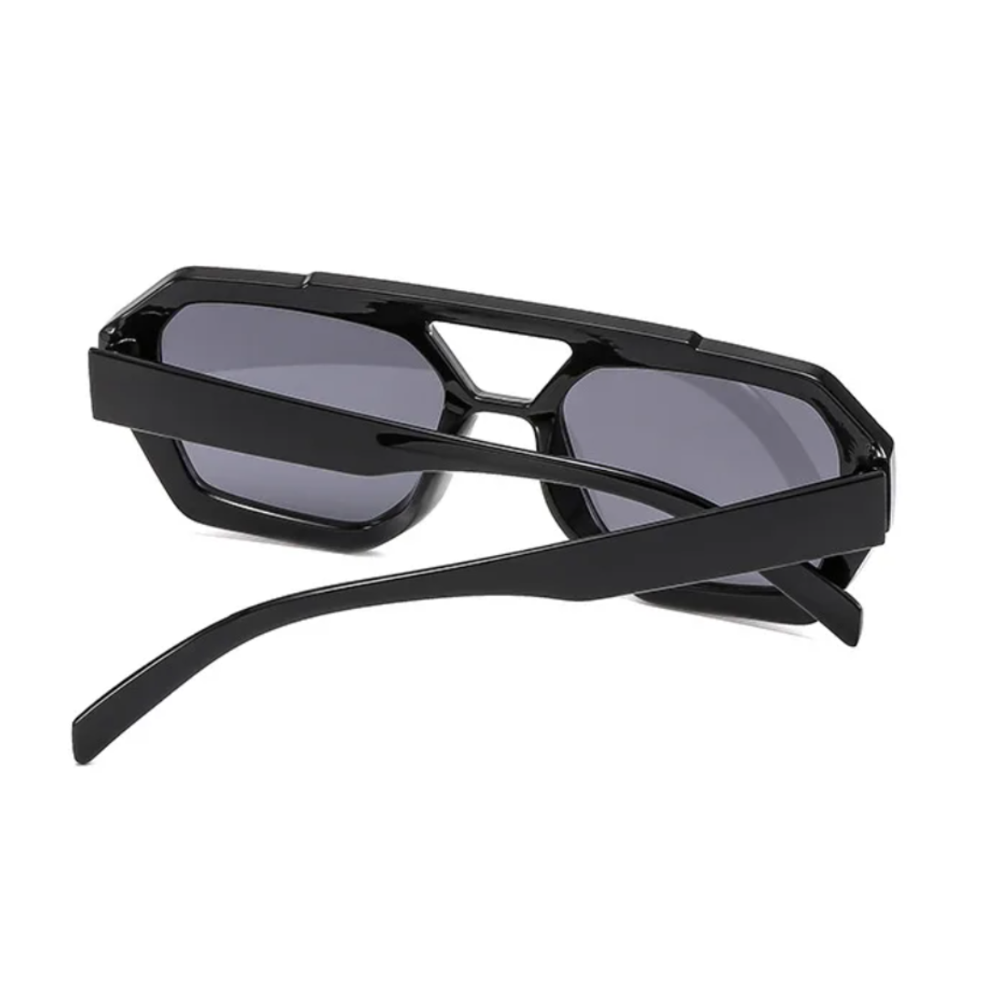 Ravena aviator women's shades in Black frame with black lenses, rear view with temples half-crossed on white  background
