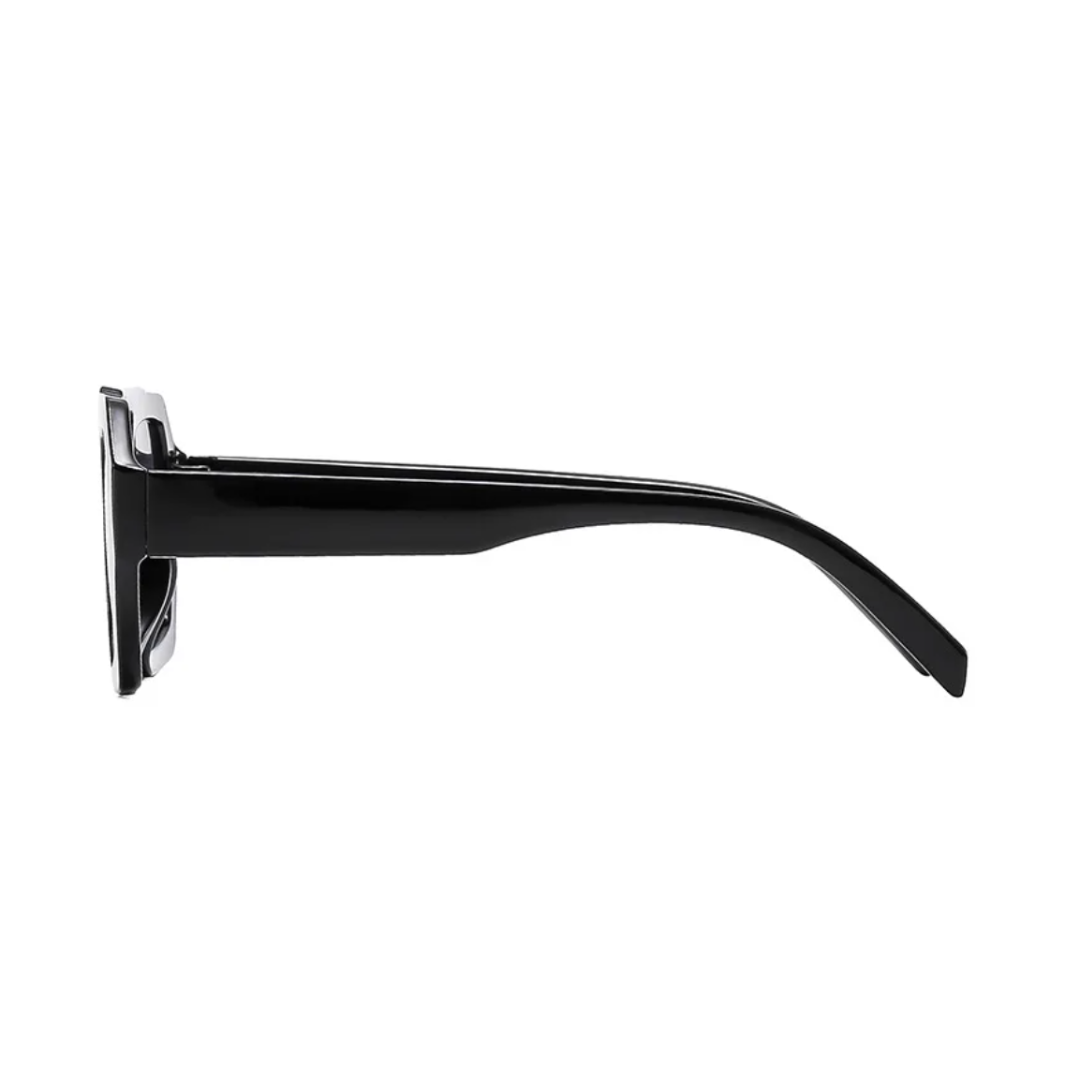 Ravena aviator women's sunglasses in Black frame with black lenses, side view on white wall background