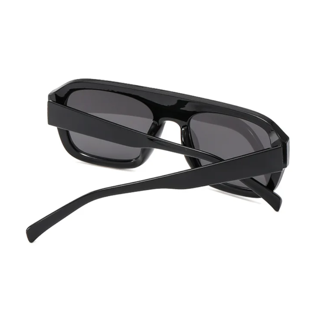 Elyss shield women's sunglasses in black acetate frame with black TAC lenses, 100% UV protection, rear view with crossed temples on white background