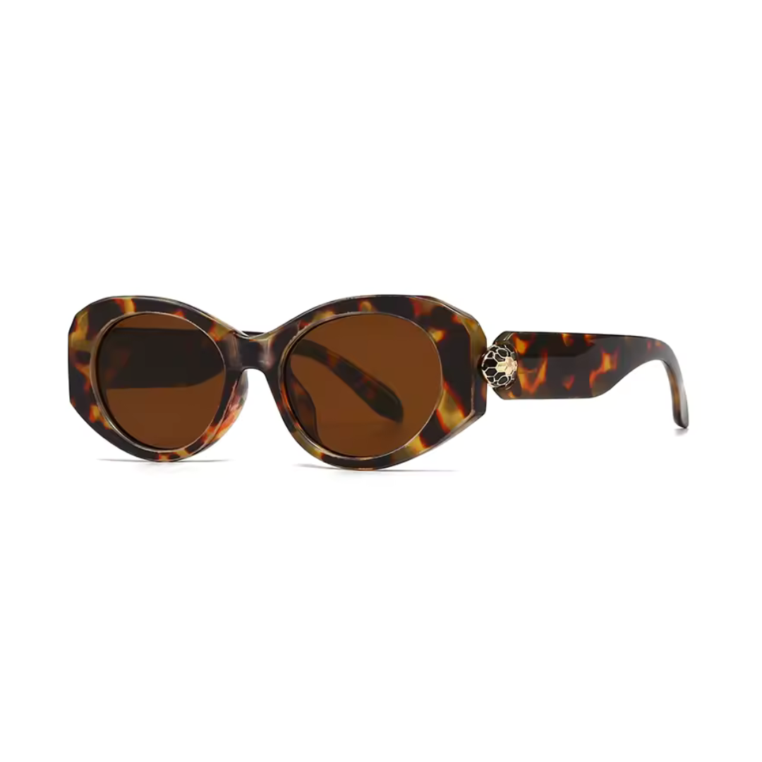 Selene women’s wide oval shades in Tortoise frame with Amber lenses, left 3/4 angle on white background — acetate frame, TAC lenses, 100% UV protection