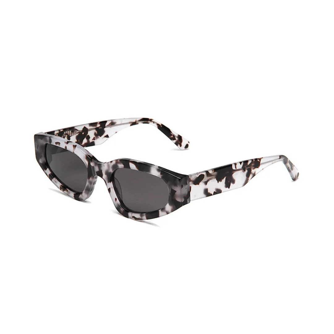 Aeris cat eye women's shades in White Tortoise acetate frame with black TAC lenses, 100% UV protection, right 3/4 angle on white background