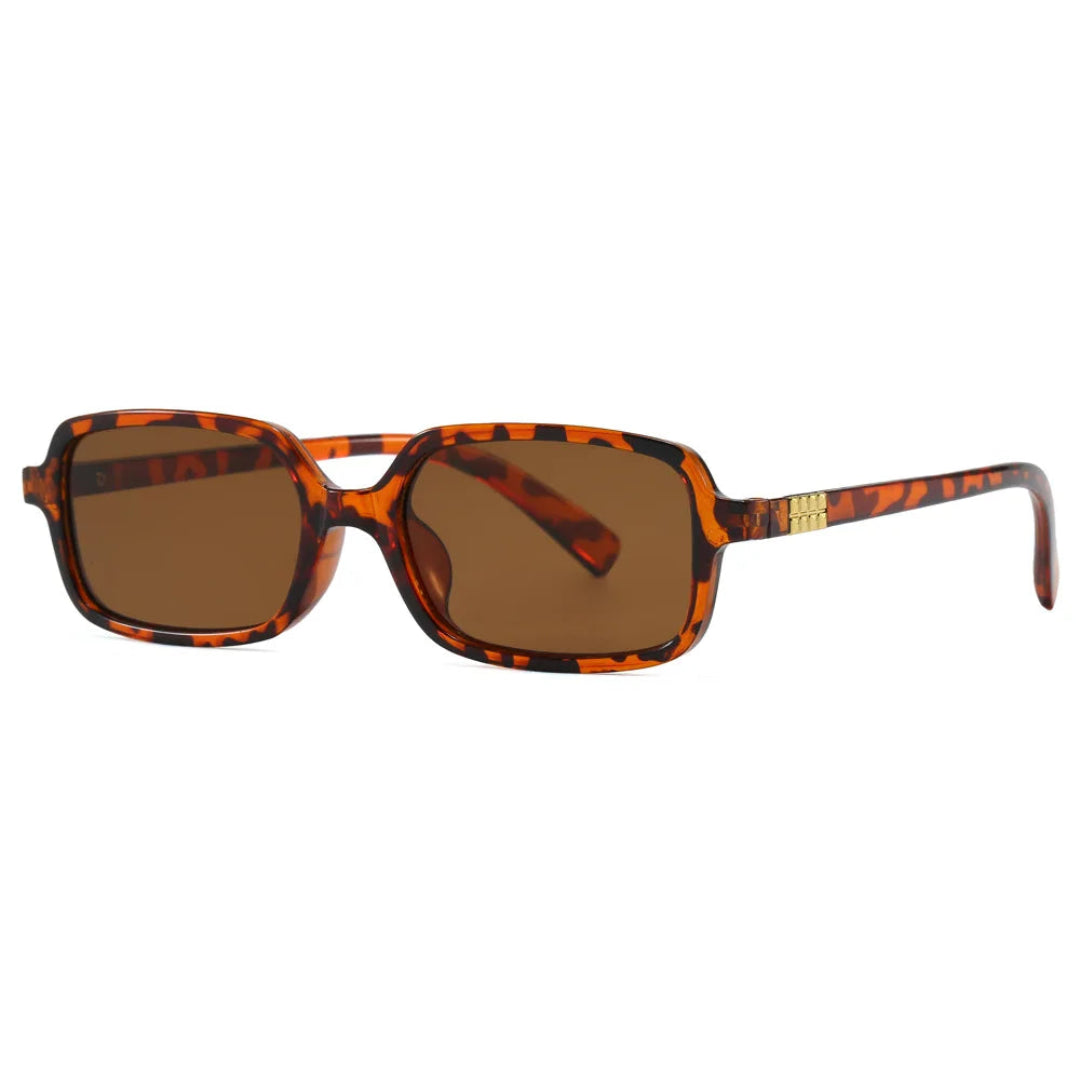 Zayla rectangular women's shades in Leopard polycarbonate frame with amber polycarbonate lenses, 100% UV protection, left 3/4 angle front view on white background