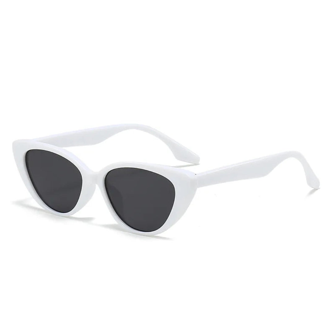 Right 3/4 angle of Noire women’s cat-eye sunglasses in White frame with Black lenses, on white background — polycarbonate frame, acrylic lenses, 100% UV protection