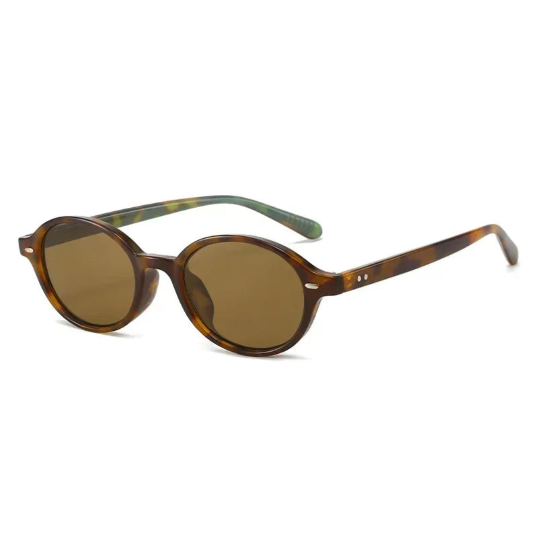 Lunéra women’s oval sunglasses in Tortoise frame with Amber lenses, right 3/4 angle on white background
