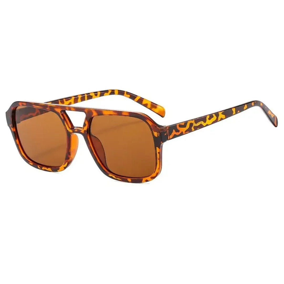 Zentha square shield women's sunglasses in Leopard frame with amber lenses, right 3/4 angle on white background