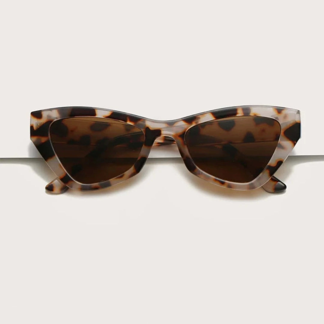 Vibea cat-eye women's sunglasses in Leopard acetate frame with amber TAC lenses, 100% UV protection, front view on white background