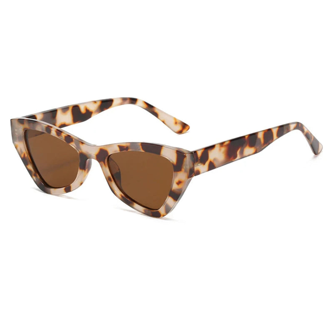 Vibea cat-eye women's sunglasses in Leopard acetate frame with amber TAC lenses, 100% UV protection, right 3/4 angle view on white background