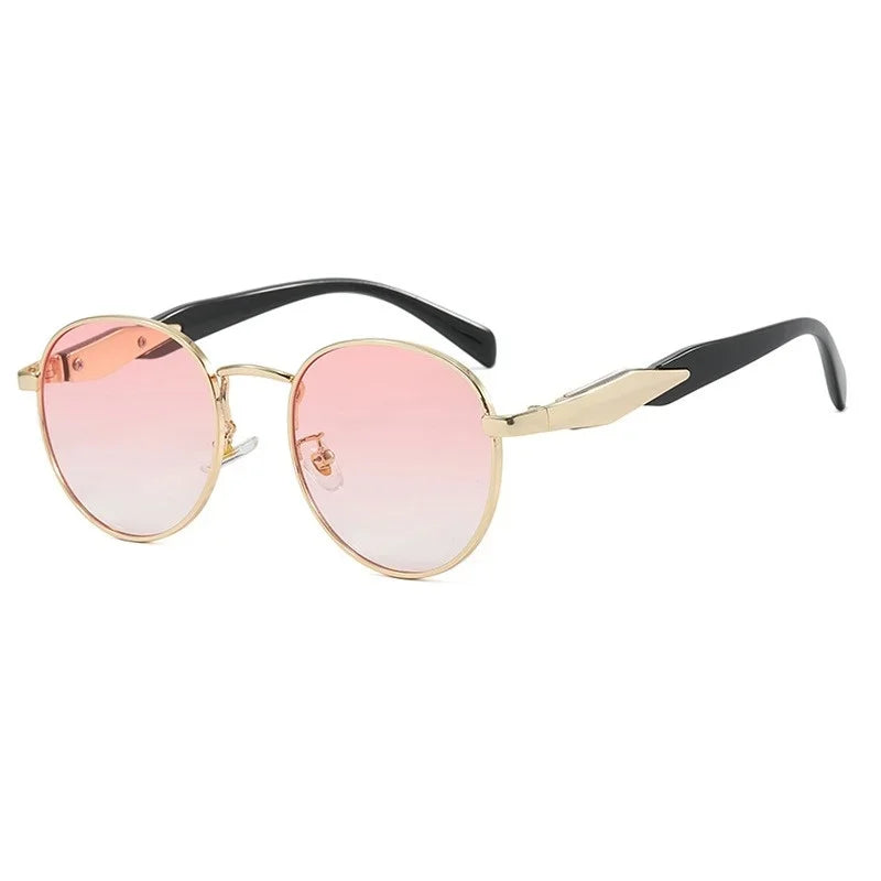 Right 3/4 angle of Domina women’s round sunglasses in Black frame with Pink Gradient lenses, on white background — metal frame, polycarbonate lenses, 100% UV protection