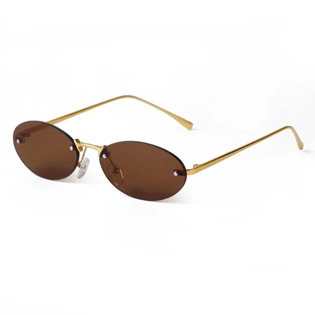 Velvet women’s oval  shades in Gold frame with Brown lenses, right 3/4 angle on white background — metal frame, acrylic lenses, 100% UV protection