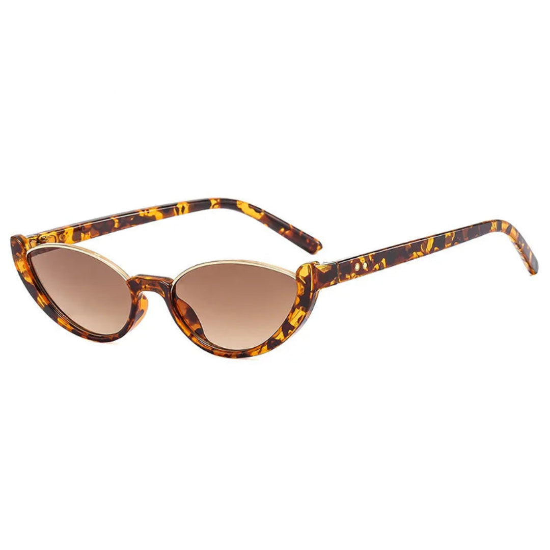 Venice women's cat-eye sunglasses, tortoise premium acetate frame with brown gradient TAC lenses offering UV400 protection, 3/4 right angle view on white background.