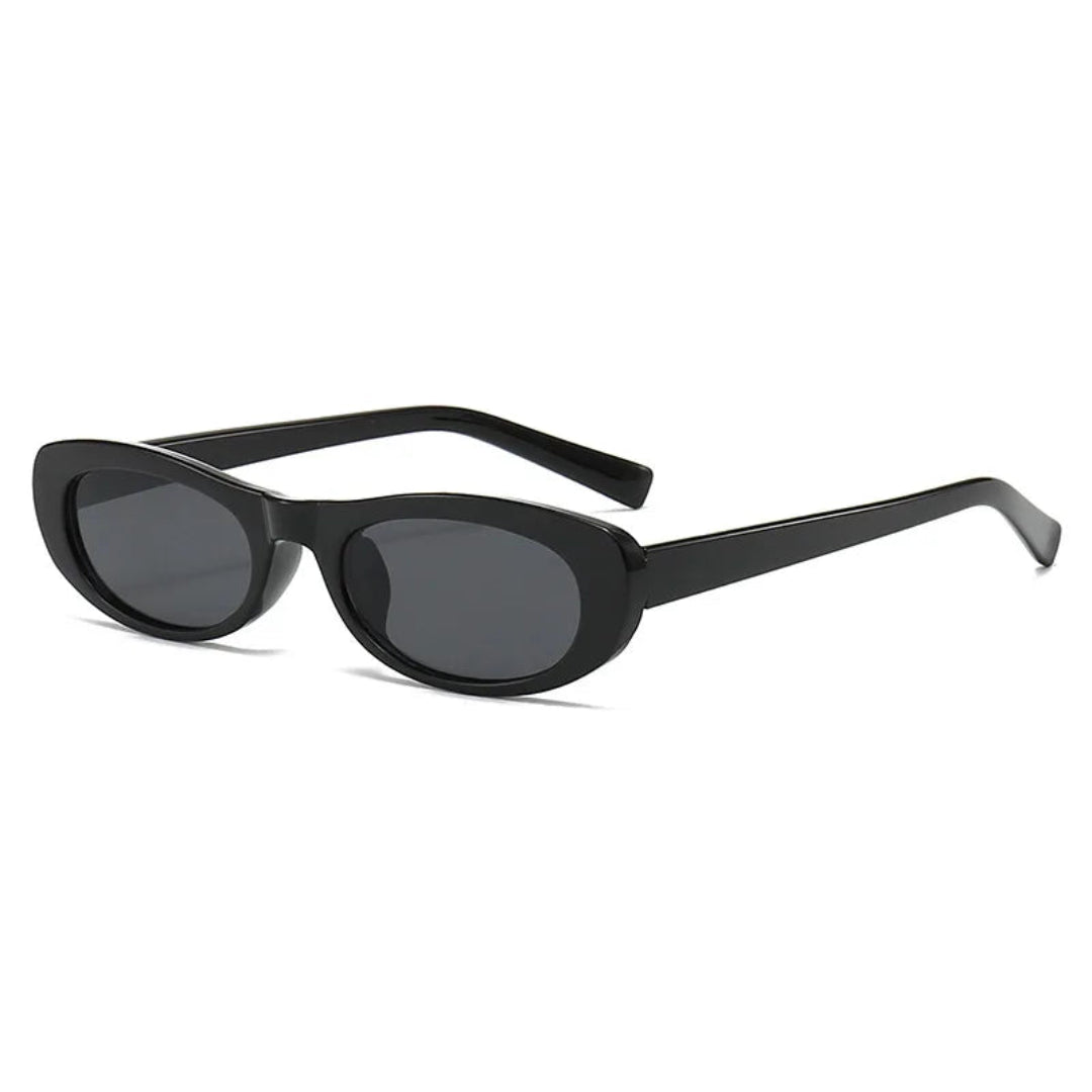 3/4 right angle view of Nova oval slim sunglasses in Black frame with Black acrylic lenses, polycarbonate frame, 100% UV protection, on white background.