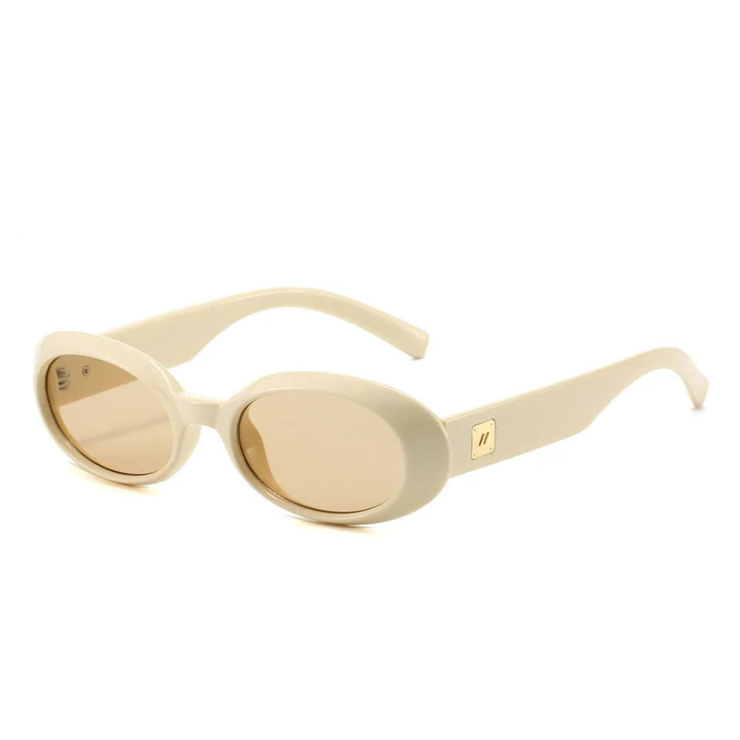 Right 3/4 angle of Vienna women’s oval sunglasses in Beige frame with Soft Beige lenses, on white background — acetate frame, polycarbonate lenses, 100% UV protection