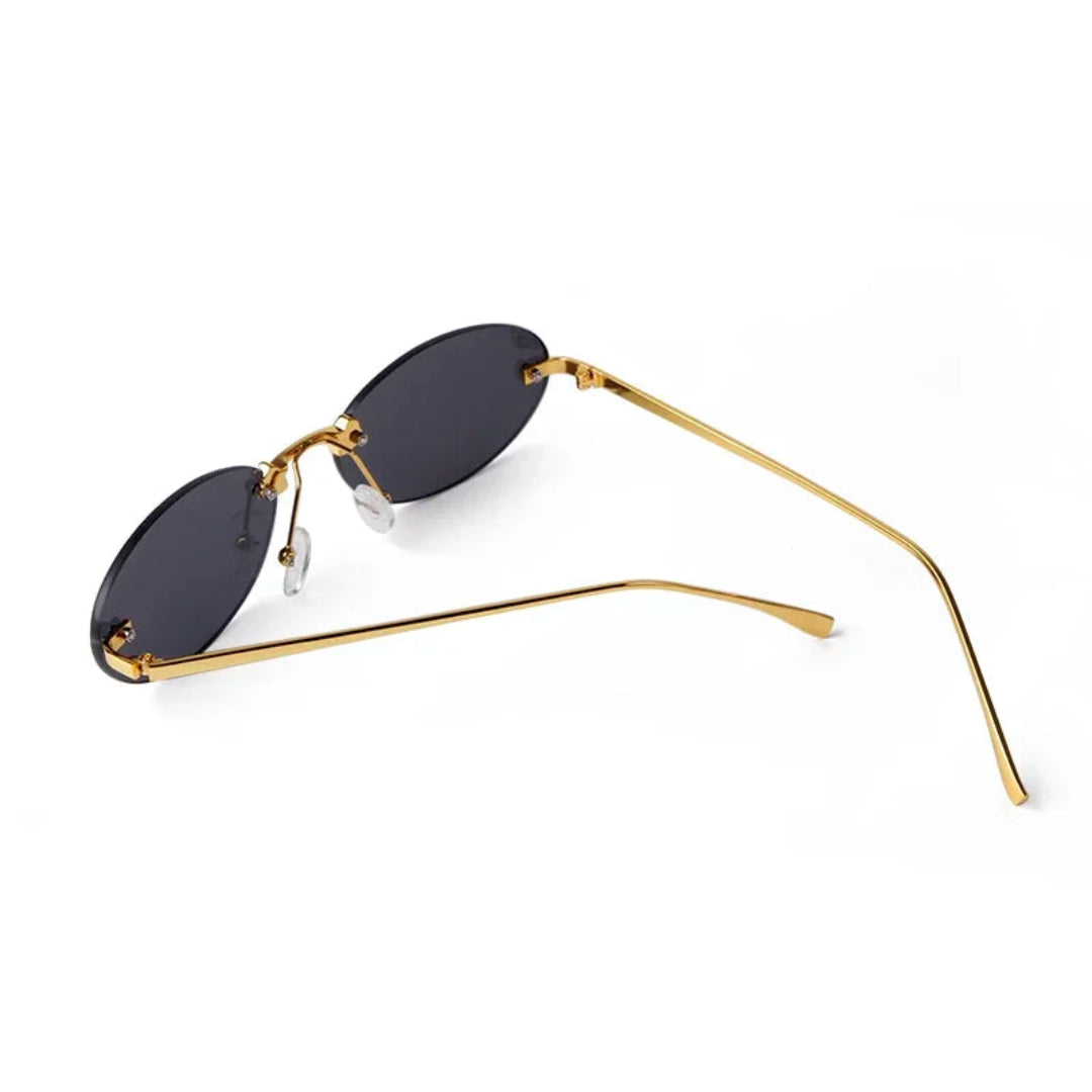 Rear view of Velvet women’s oval sunglasses in Gold frame with Black lenses, temples open, on white background — metal frame, acrylic lenses, 100% UV protection
