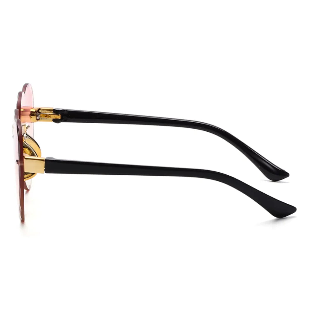 Side view of Noémie women’s heart-shaped sunglasses in Black frame with Rose Gradient lenses, on white background — polycarbonate frame, polycarbonate lenses, 100% UV protection