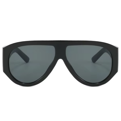 Front view of Delphine women’s shield sunglasses in Black frame with Black lenses, on white background — acetate frame, TAC lenses, 100% UV protection