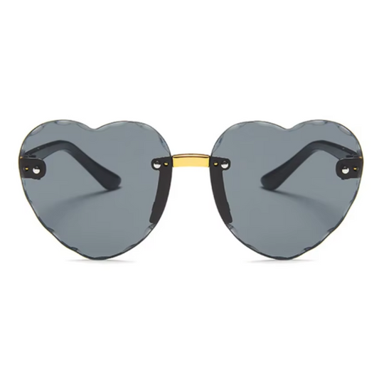 Front view of Noémie women’s heart-shaped shades in Black frame with Black lenses, on white background — polycarbonate frame, polycarbonate lenses, 100% UV protection