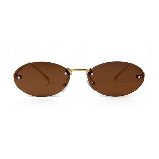 Front view of Velvet women’s oval sunglasses in Gold frame with Brown lenses, on white background — metal frame, acrylic lenses, 100% UV protection