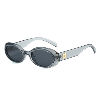 Right 3/4 angle of Vienna women’s oval sunglasses in Transparent Gray frame with Black lenses, on white background — acetate frame, polycarbonate lenses, 100% UV protection