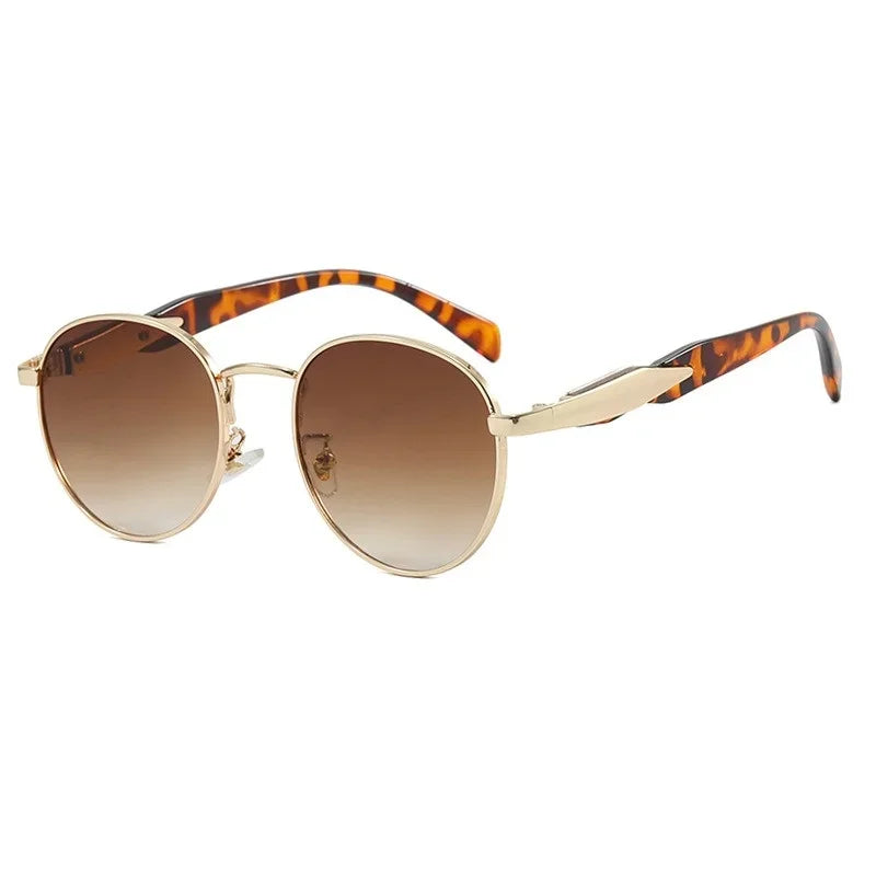 Right 3/4 angle of Domina women’s round sunglasses in Tortoise frame with Brown Gradient lenses, on white background — metal frame, polycarbonate lenses, 100% UV protection