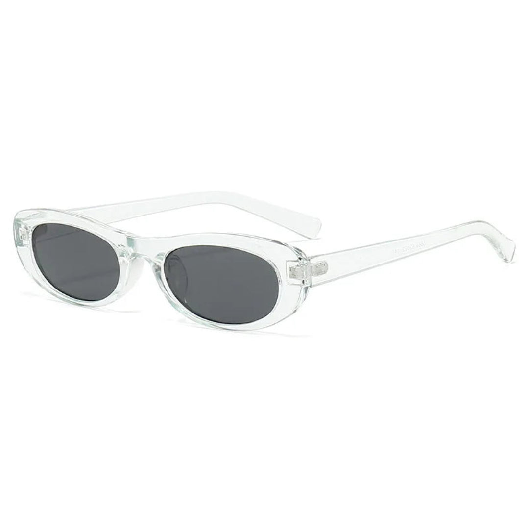 3/4 right angle view of Nova oval slim sunglasses in Transparent frame with Black acrylic lenses, polycarbonate frame, 100% UV protection, on white background.