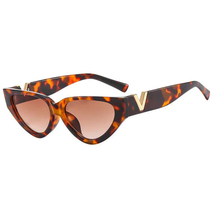 Right 3/4 angle of Riviera women’s cat-eye sunglasses in Tortoise frame with Amber Gradient lenses, on white background — polycarbonate frame, acrylic lenses, 100% UV protection