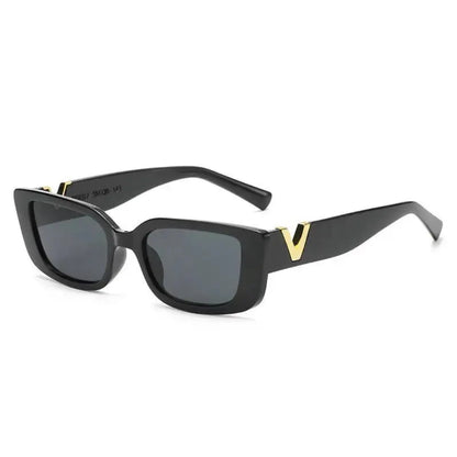 Right 3/4 angle of Celestia women’s rectangle sunglasses in Black frame with Black lenses, on white background — acetate frame, polycarbonate lenses, 100% UV protection
